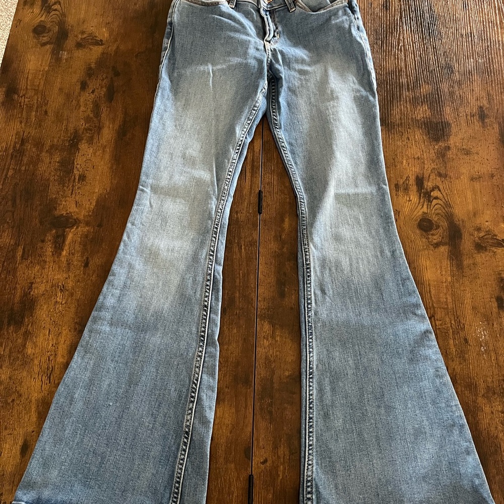 Hollister Blue Flare Wide Leg Jeans with Distressing and Faded Wash